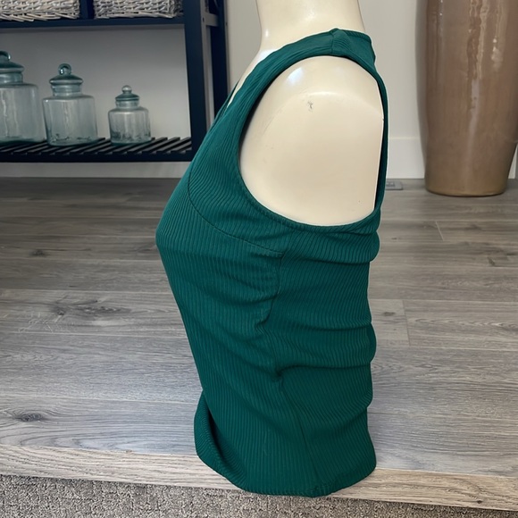 3/$35 Ricki’s tank tops SET in a gold sparkle and green asymmetrical neckline. - Picture 4 of 10